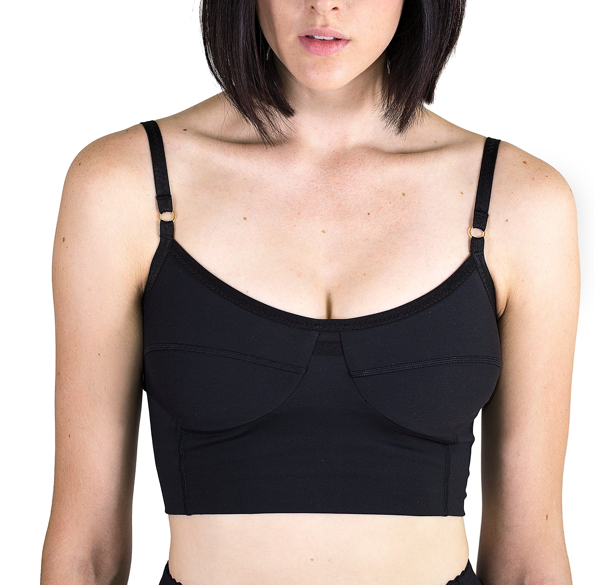 Beautifully designed Bralette in black with grosgrain elastic straps, flattering seam detail and funtional loop at center front.