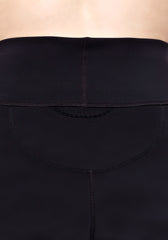 Back pocket close up of our high waisted legging in Black with hidden back pocket and foldover waistband made from premium high performance activewear fabric that wicks moisture away from your body to keep you comfortable