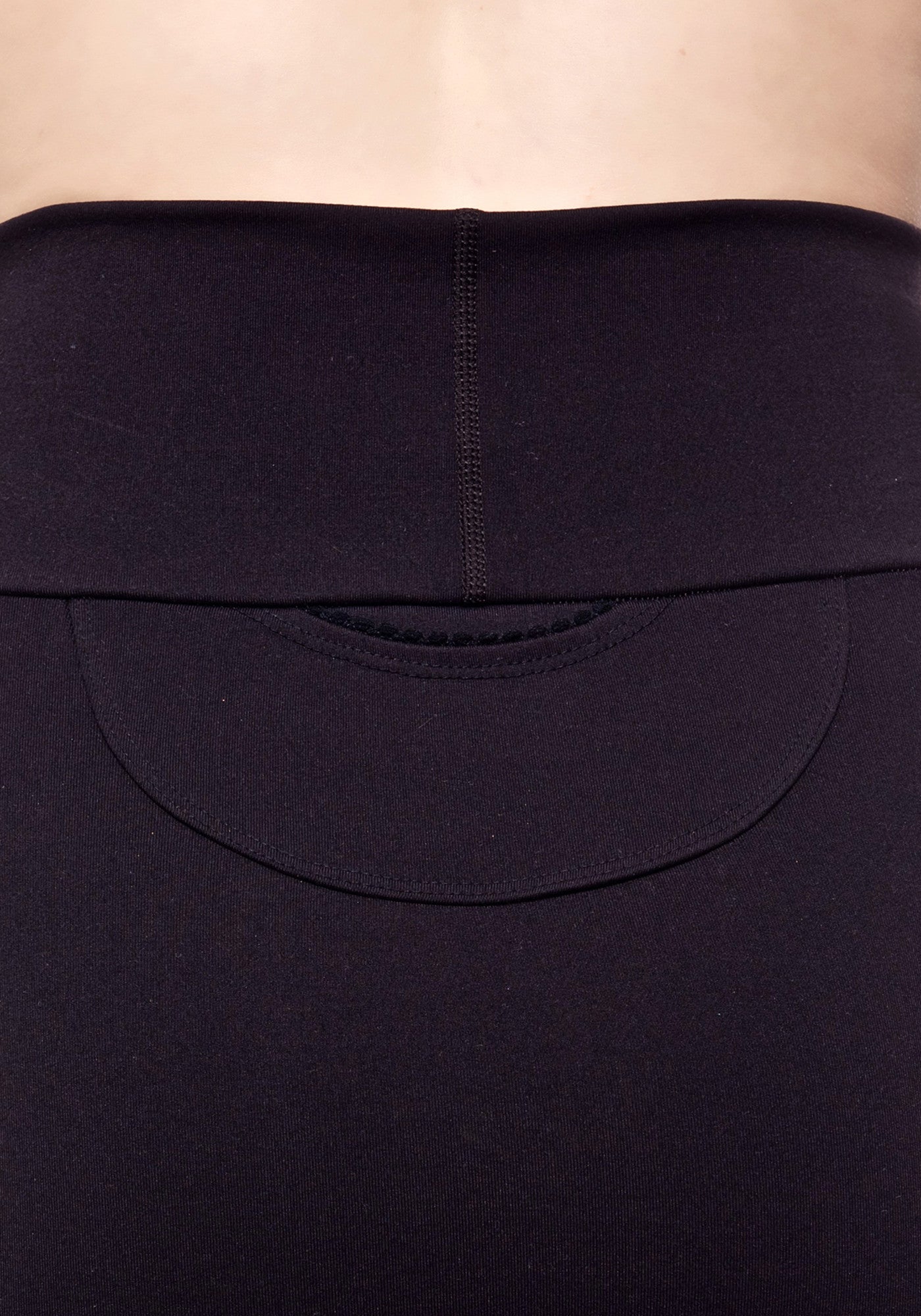 Back Pocket close up of our high waisted black mini skirt made from premium high performance activewear fabric with handy back waist pocket