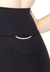 Back pocket close up of our Black high waisted mini skirt with white side panel and stitching made from premium high performance activewear fabric with handy back waist pocket
