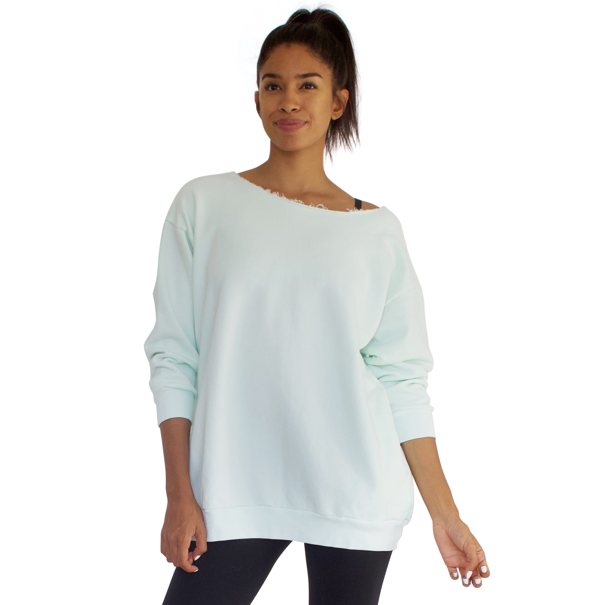 Our best selling oversized french terry top with raw edge neckline, side seam pockets shown here in Mint Green.