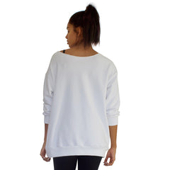 Back view of Our best selling oversized french terry top with raw edge neckline, side seam pockets shown here in White