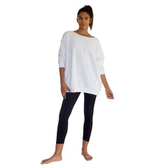 Our best selling oversized french terry top with raw edge neckline, side seam pockets shown here in White