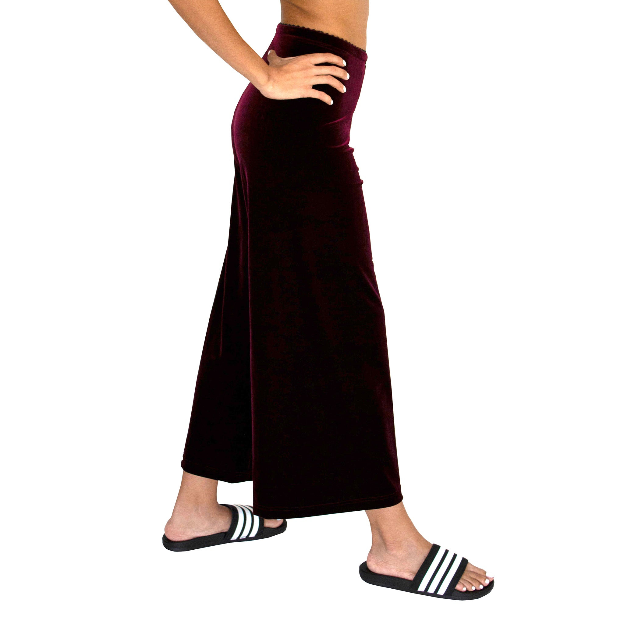 Side view of our Cropped Length Stretch Velvet Pant in Sangria Wine (Burgundy) has elastic waist and 26" inseam.