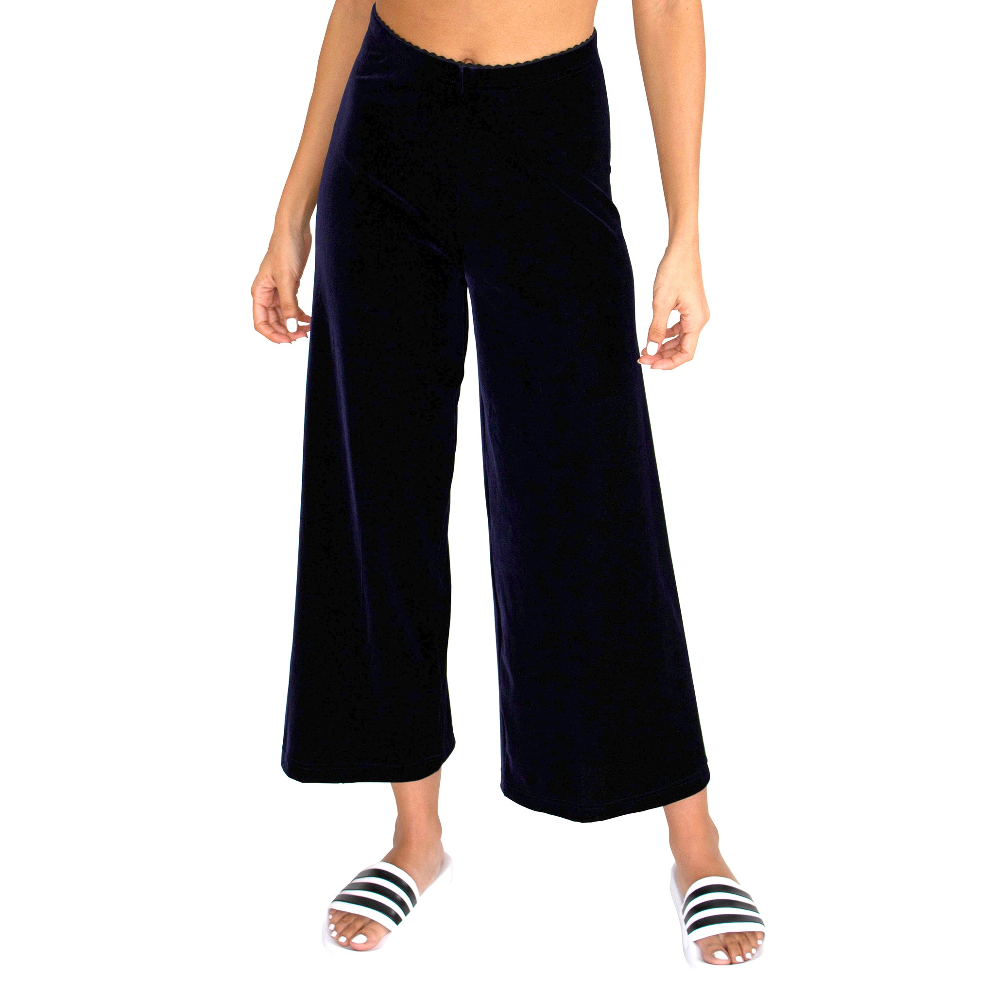 Front view of our Cropped Length Stretch Velvet Pant in Sapphire (Dark Blue) has elastic waist and 26" inseam.