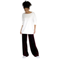 Stretch Velvet Pant in Sangria Wine (Burgundy) has elastic waist and 32" inseam. Worn with our Pullova top in white.